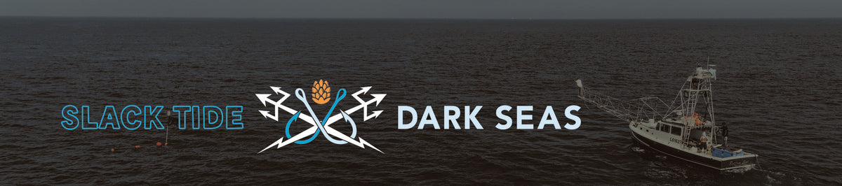 A dark seascape with a fishing boat on the right and the text 'SLACK TIDE' and 'DARK SEAS' across the center, with a crossed-anchor-and-fish logo between the words.